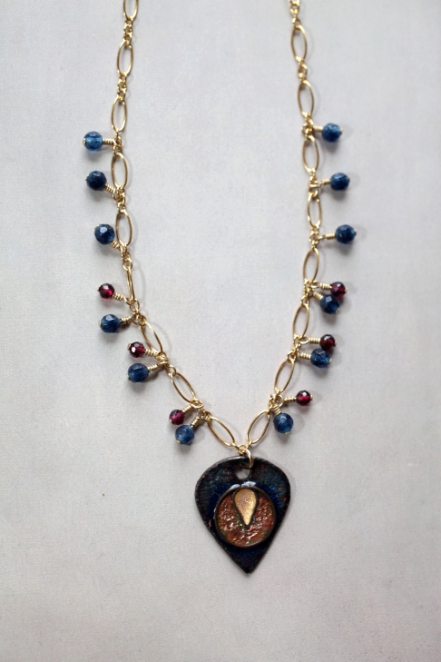 Harem Necklace by Catherine DeYoung | Vitreous enamel on copper and 18k gold on a 14k gold-filled chain with garnet and blue crystal gemst Harem Necklace